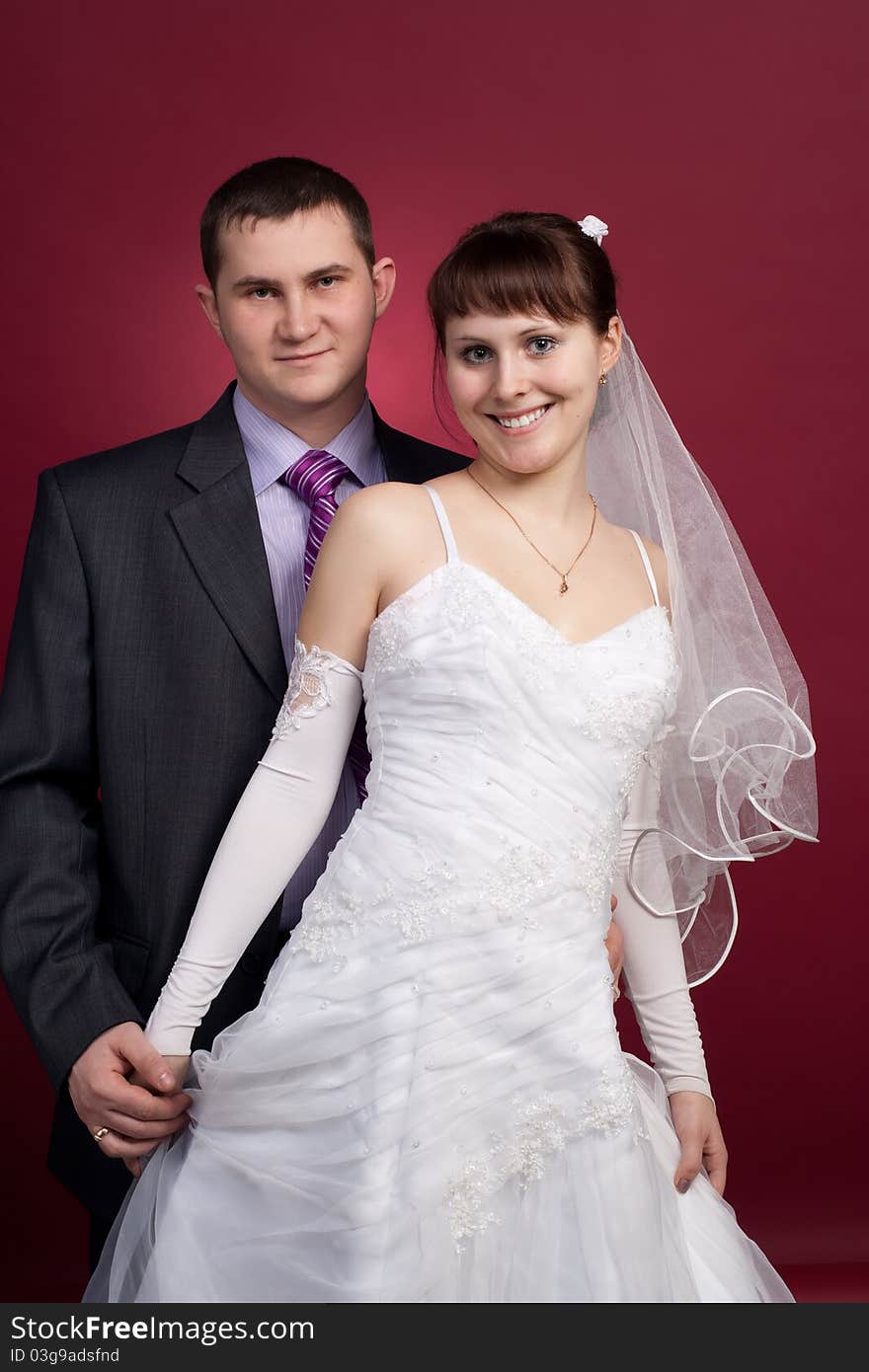 Couple newlyweds in wedding dress and suit