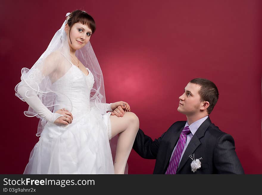 Couple Newlyweds In Wedding Dress And Suit