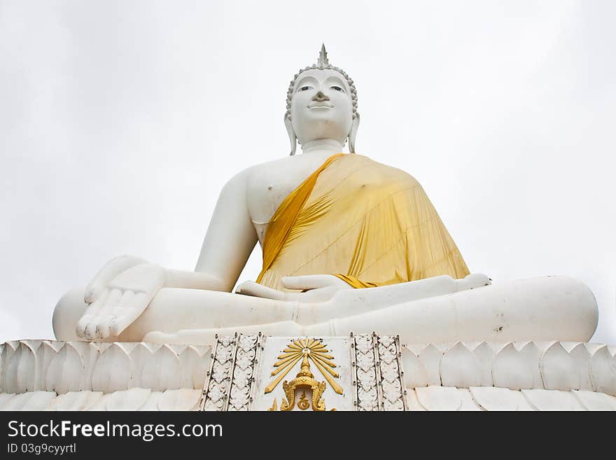 White Buddha on white sky background,Thailand