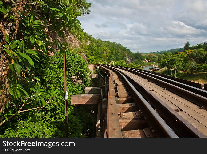 Railway beside mountain