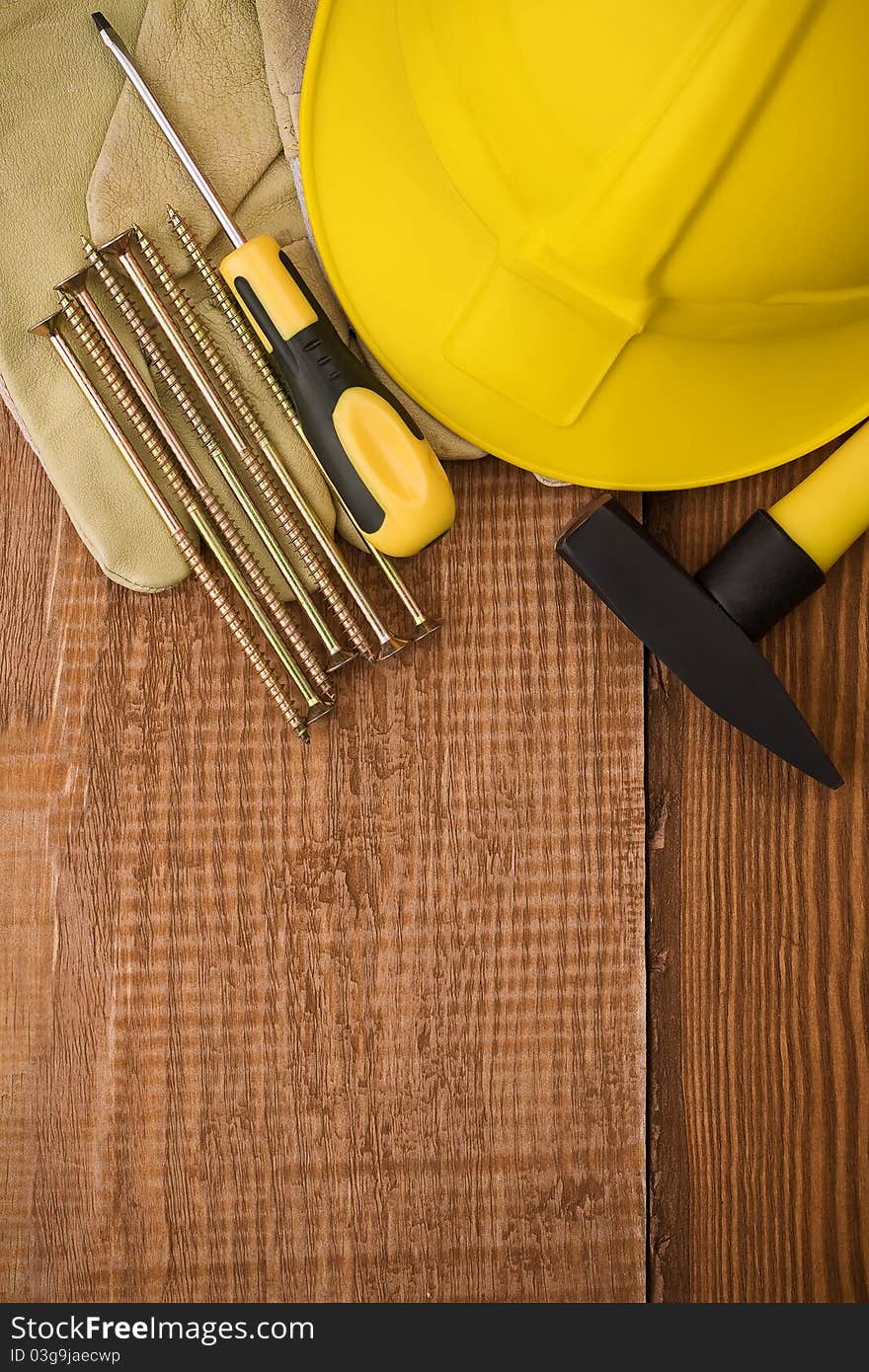 Copyspace background of wooden brown board with tools. Copyspace background of wooden brown board with tools