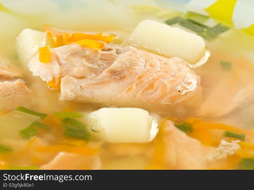 Salmon soup, potato and vegetables