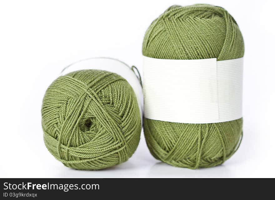 Two green woolen a thread. Two green woolen a thread