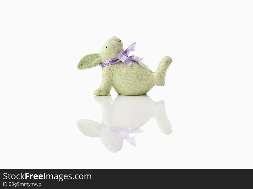 A green easter-bunny on white background