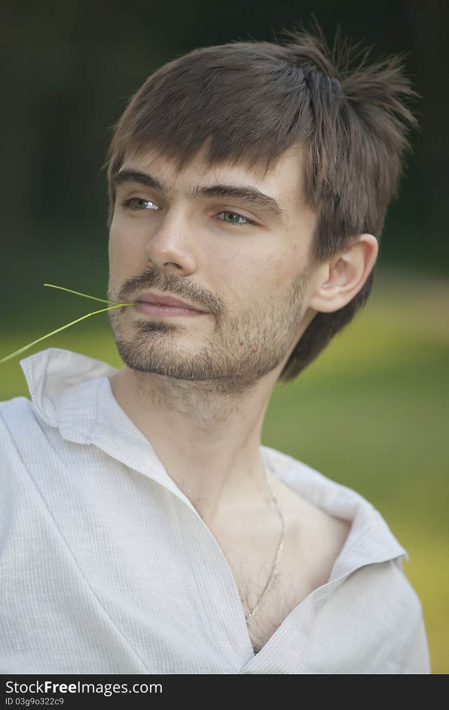 Relaxed man with straw