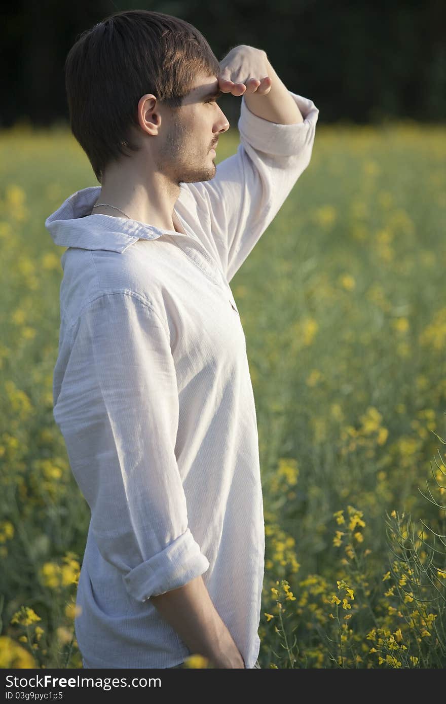 Man in field looking