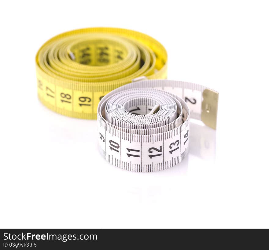 Two measuring tapes isolated on white background