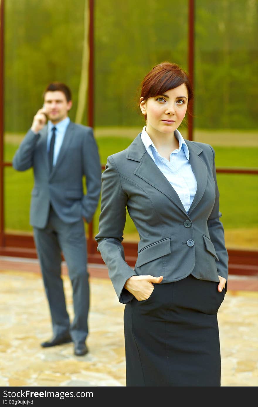 Business People In Front Of Building