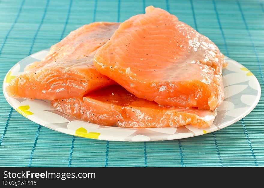 Chunks of salted salmon on a plate