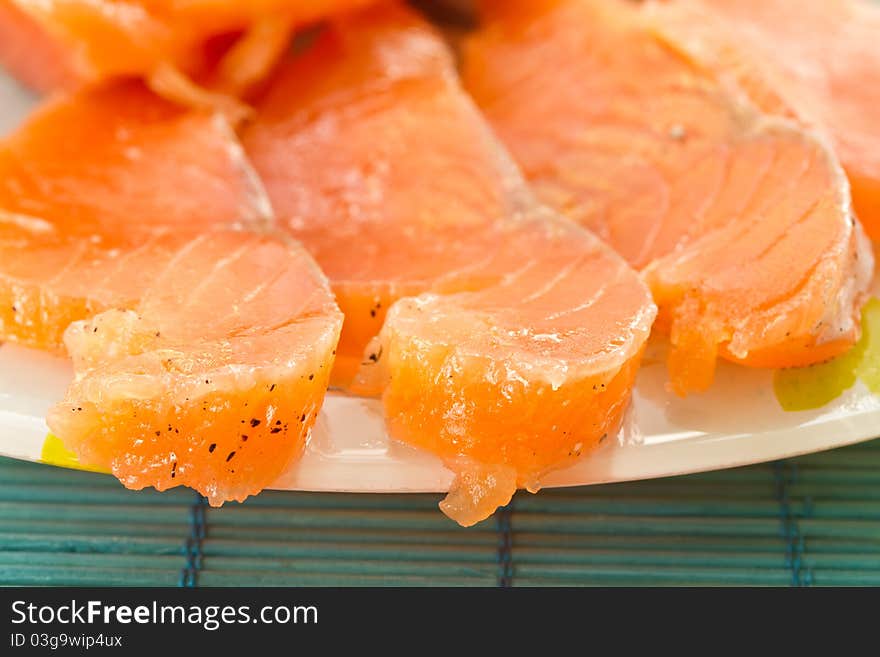 Chunks of salted salmon on a plate