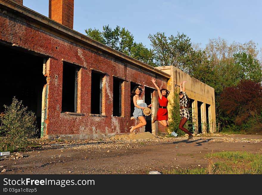 Happy young women jumping