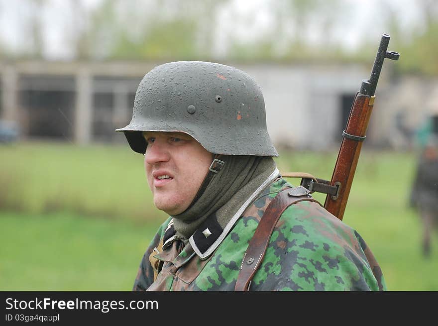 Member of Red Star history club wears historical German uniform during historical reenactment of WWII in Kiev,Ukraine. Member of Red Star history club wears historical German uniform during historical reenactment of WWII in Kiev,Ukraine