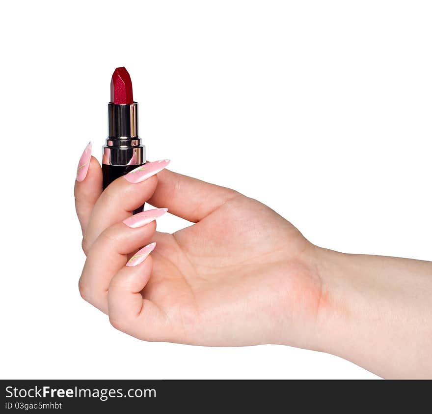 In the photo represented a hand holding a lipstick. In the photo represented a hand holding a lipstick