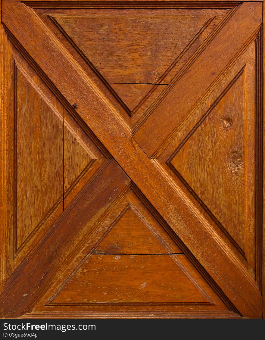 Wooden wall with cross pattern