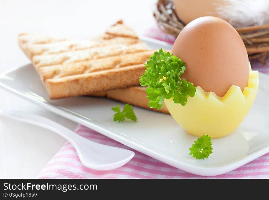 Boiled egg with fresh toast