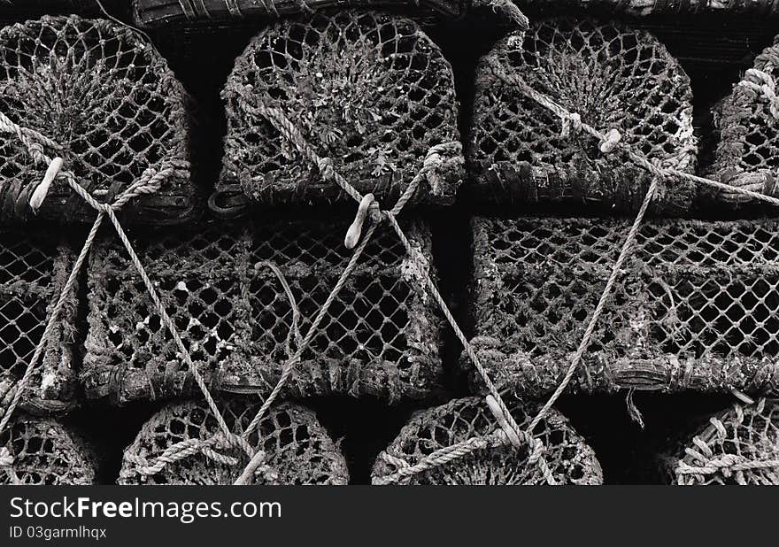 This is a 35mm Black and White Film shot of fishing equipment in the harbour of Aberystwyth, Wales. This is a 35mm Black and White Film shot of fishing equipment in the harbour of Aberystwyth, Wales.