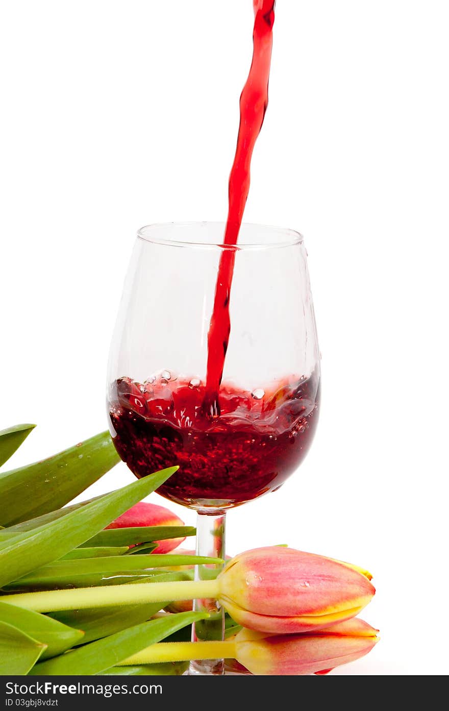 Red wine pouring into wine glass background