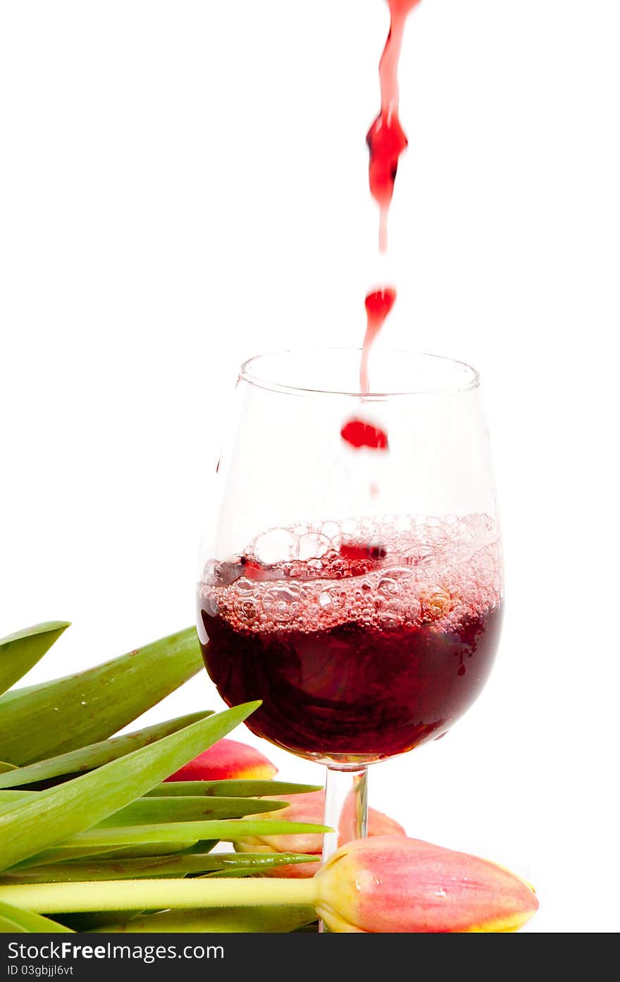 Red wine pouring into wine glass background