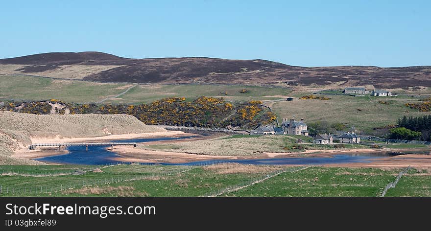 The Bridge at Strath Halladale, near Melvich, Caithness, Scotland, U.K  Melvich is a village in the county of Sutherland on the North Coast of Scotland. It is situated on the A836 road, near the mouth of the River Halladale. It has a successful Gaelic choir. The A897 road which runs from Helmsdale, through the Strath of Kildonan and past Kinbrace, terminates at Melvich. River Halladale in Sutherland, in the Highland council area of Scotland. Achiemore is situated to the north of Smigel Burn on the right bank of the Halladale River just beyond where the Allt an Tigh-choinneirnh flows and Upper Bighouse. The village and station of Forsinard is 15 km to the south, and Melvich, on the north coast, is roughly 4.5 miles &#x28;7 km&#x29; to the north. Culfern is just to the north and contains ruins. The A897 road passes through Achiemore. Achiemore contains the Strath Halladale Mission Church, a Grade C listed building which is dated to 1845. It is a rectangular rubble church with a long 4-bay elevation facing the A897 to the west. It became a listed building on 7 March 1984. Ford across Allt an Tigh-choinneirnh as it joins the Halldale River, west of Achiemore
. The Bridge at Strath Halladale, near Melvich, Caithness, Scotland, U.K  Melvich is a village in the county of Sutherland on the North Coast of Scotland. It is situated on the A836 road, near the mouth of the River Halladale. It has a successful Gaelic choir. The A897 road which runs from Helmsdale, through the Strath of Kildonan and past Kinbrace, terminates at Melvich. River Halladale in Sutherland, in the Highland council area of Scotland. Achiemore is situated to the north of Smigel Burn on the right bank of the Halladale River just beyond where the Allt an Tigh-choinneirnh flows and Upper Bighouse. The village and station of Forsinard is 15 km to the south, and Melvich, on the north coast, is roughly 4.5 miles &#x28;7 km&#x29; to the north. Culfern is just to the north and contains ruins. The A897 road passes through Achiemore. Achiemore contains the Strath Halladale Mission Church, a Grade C listed building which is dated to 1845. It is a rectangular rubble church with a long 4-bay elevation facing the A897 to the west. It became a listed building on 7 March 1984. Ford across Allt an Tigh-choinneirnh as it joins the Halldale River, west of Achiemore