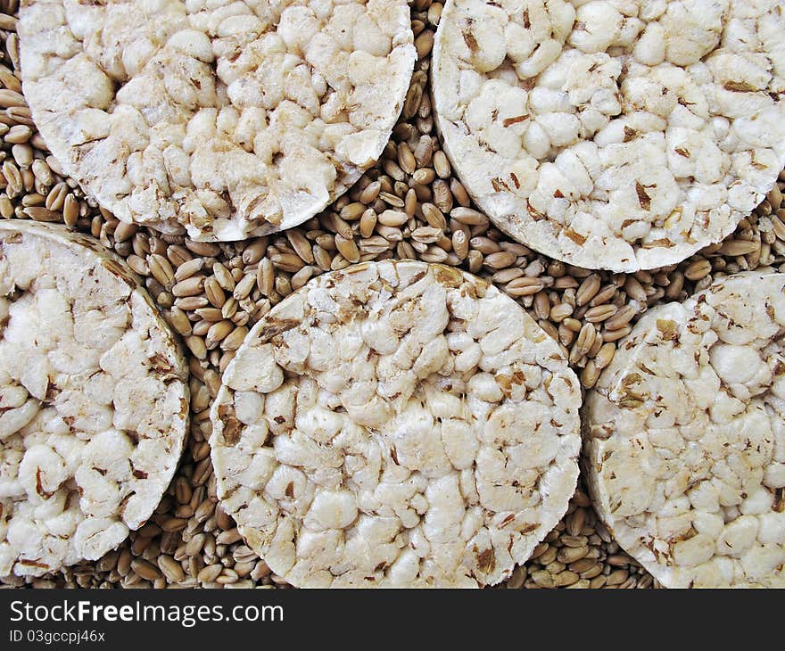 Bread crisps and grains of wheat