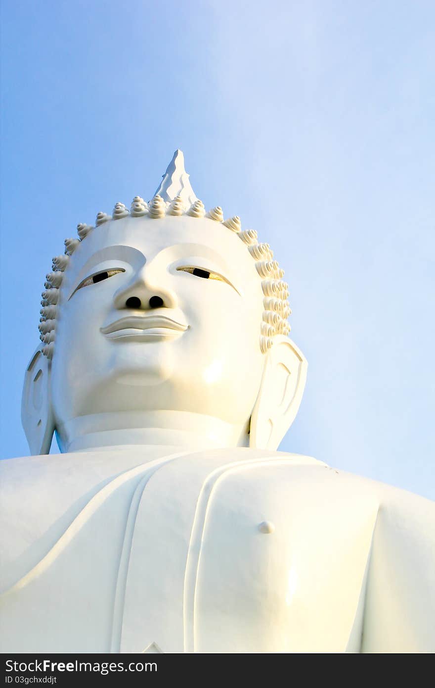 Close-up white Buddha's face. Close-up white Buddha's face