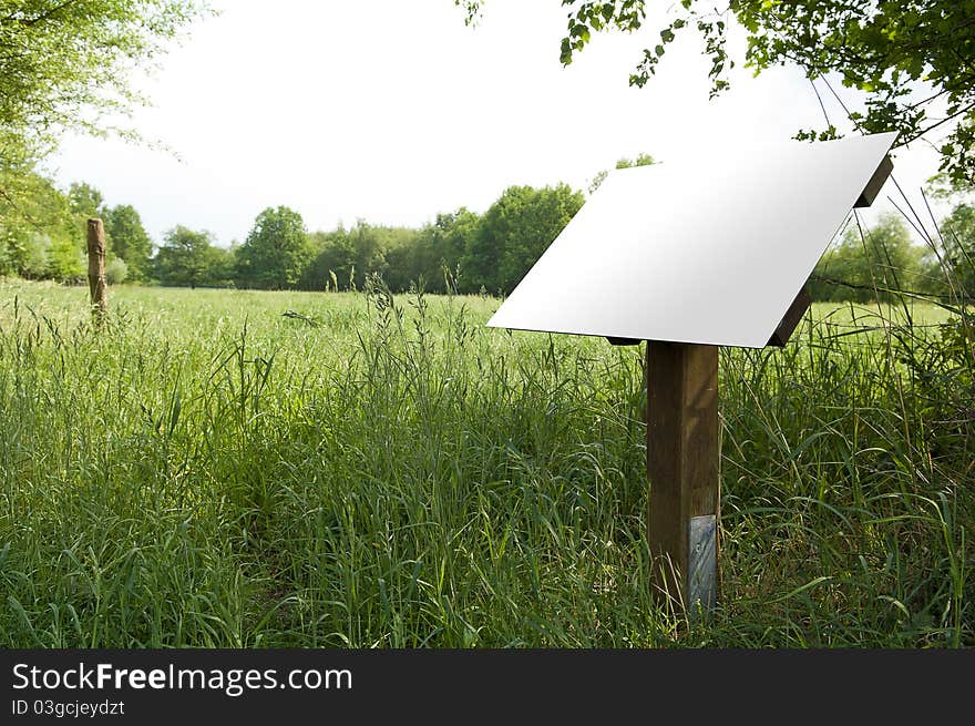 White sign in nature environment