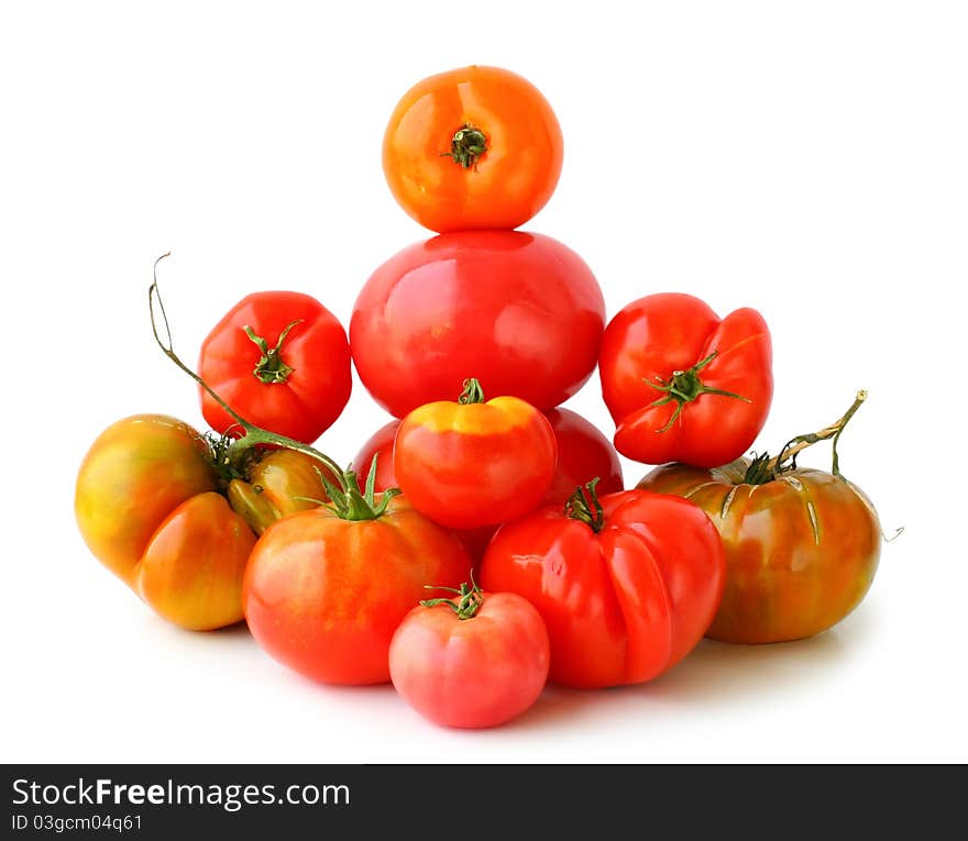 Different fresh tomatoes on the white background