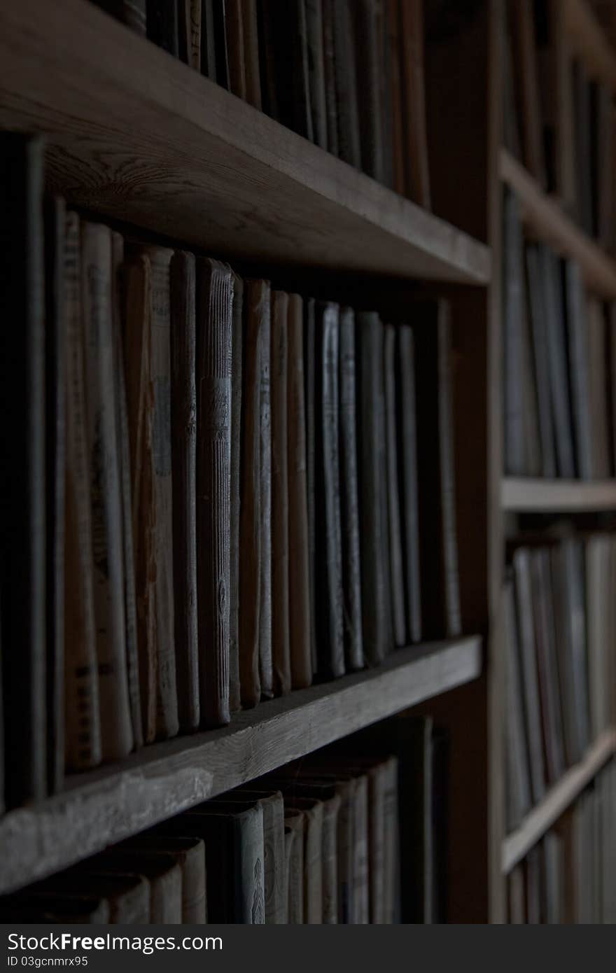 Shelves of old books in the library. Shelves of old books in the library