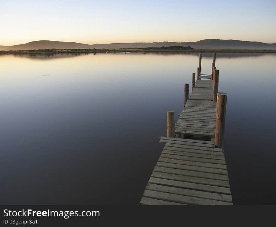 Tranquil Jetty Over A River