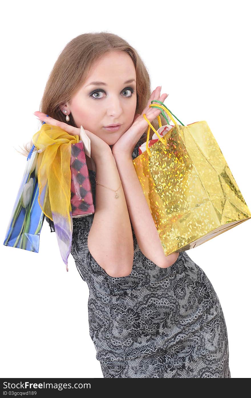 Funny girl with shopping bags over white background