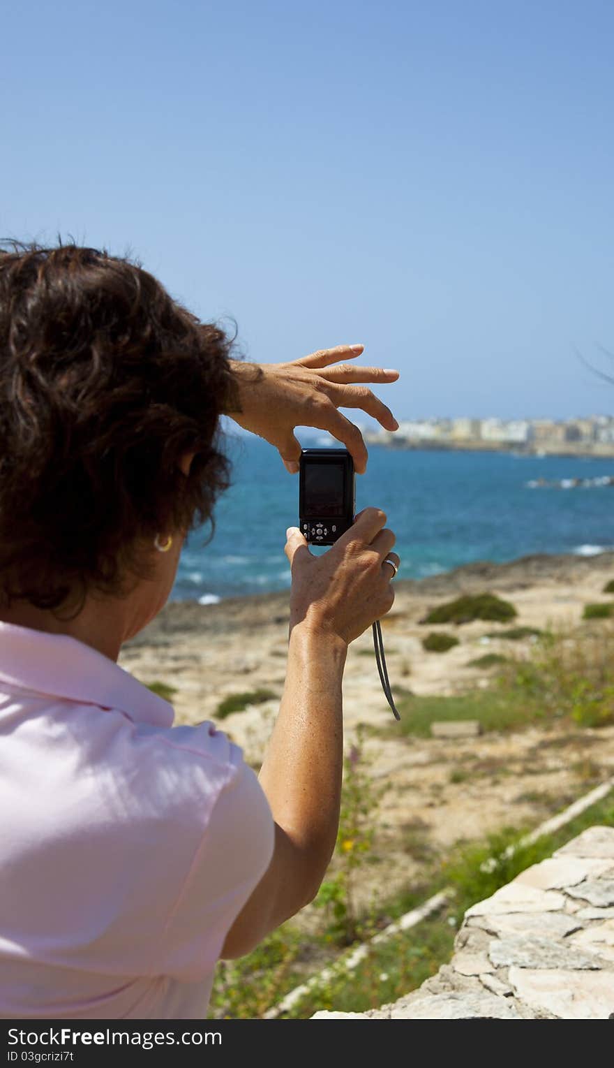 A female photographer taking picture