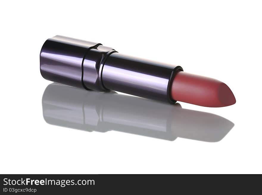 Rose lipstick isolated on white background