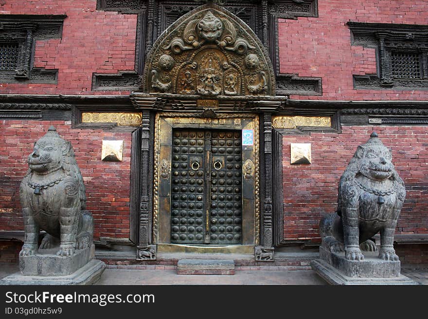 The golden door of the ancient royal palace of patan in nepal