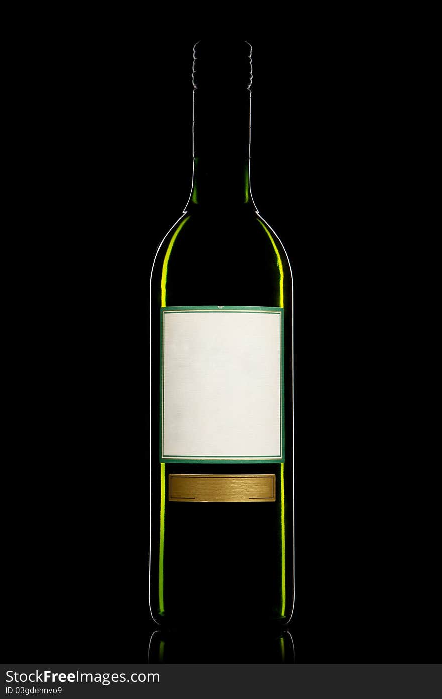 Bottle of white wine with label on a black