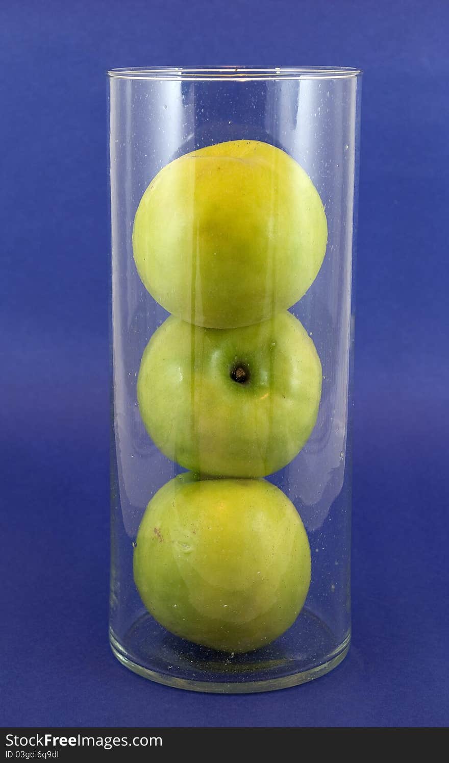 Glass Cube With Green Apples