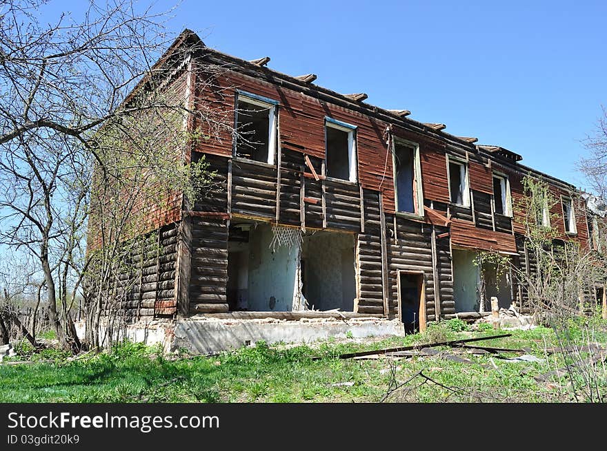 Demolition of old two-storeyed wooden house. Demolition of old two-storeyed wooden house