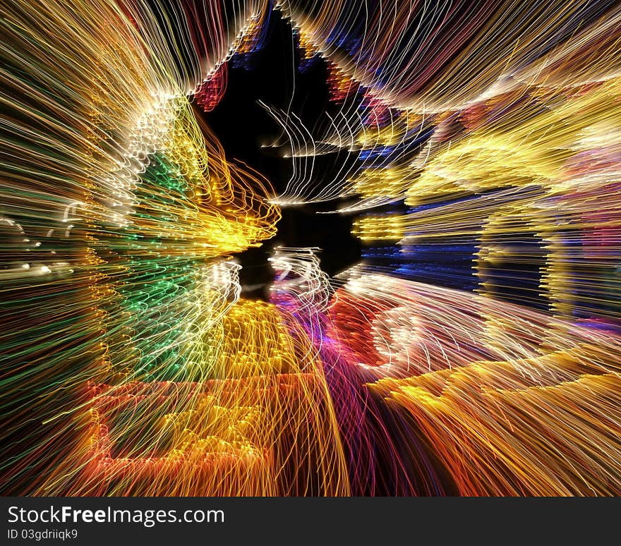 Abstract photo of multi colored lights using a 1/2 second shutter speed (tripod mounted) and an aperture of f10. Abstract photo of multi colored lights using a 1/2 second shutter speed (tripod mounted) and an aperture of f10.