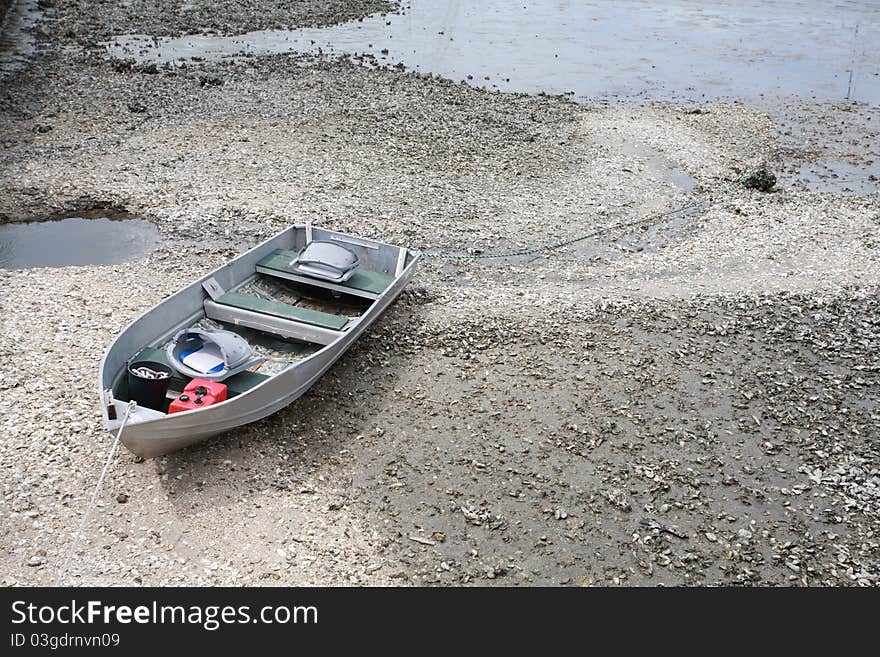 Old fishing boat by the sea shore