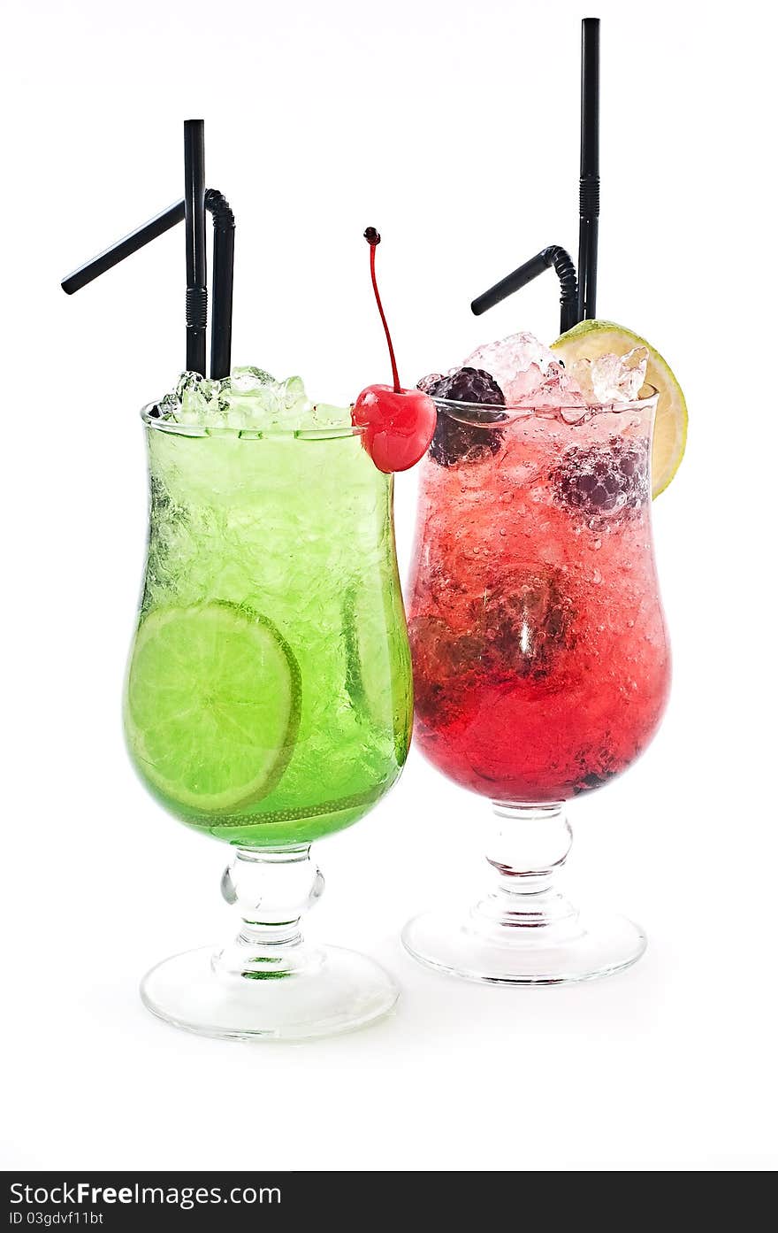 Red and green cocktails in tubules standing nearby on a white background. Red and green cocktails in tubules standing nearby on a white background