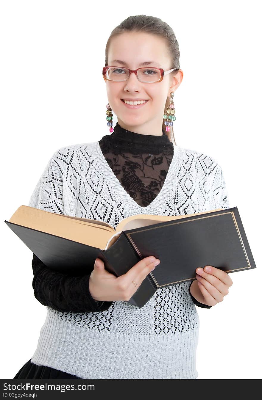 Girl with glasses reading a thick book