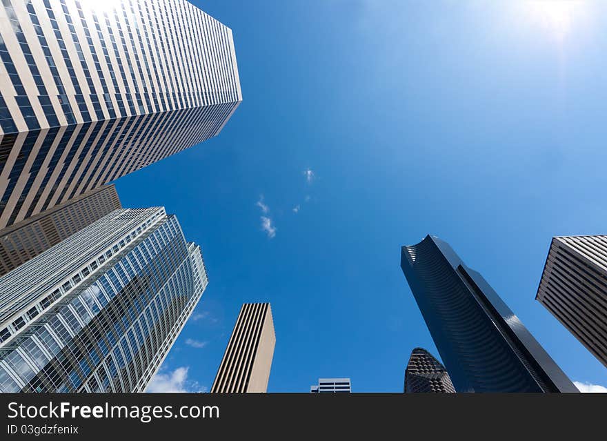 Looking up at a group of modern office buildings