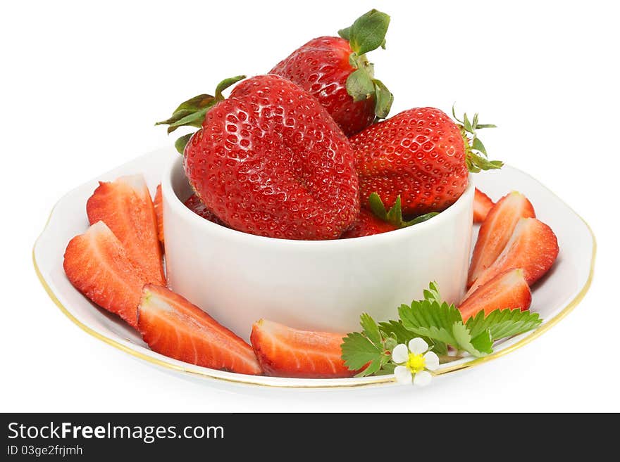 Strawberries on a plate isolated on white background