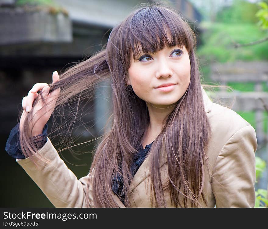 Face of the young beautiful woman outdoors. Face of the young beautiful woman outdoors