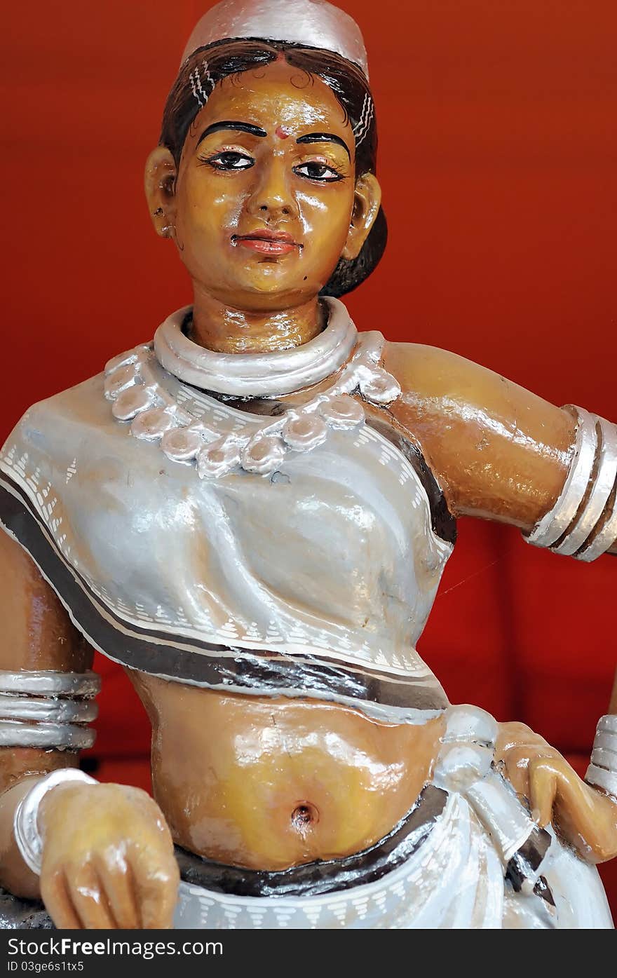 Beautiful sculpture model of a tribal Indian woman wearing traditional clothes. Beautiful sculpture model of a tribal Indian woman wearing traditional clothes