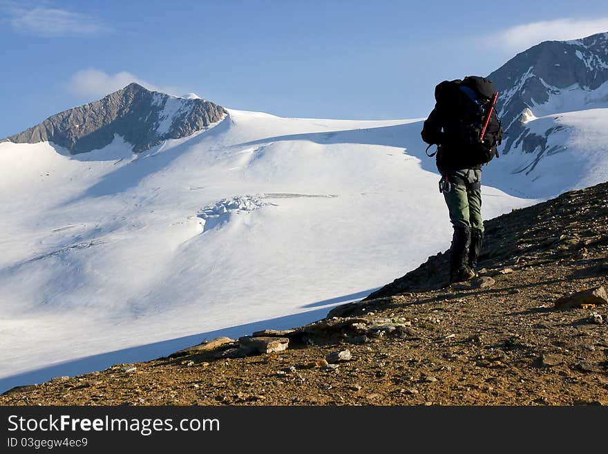 Mountaineer Above A Glacier