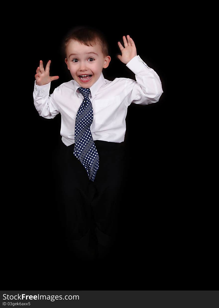 Little boy in shirt and tie making silly face. isolated. Little boy in shirt and tie making silly face. isolated