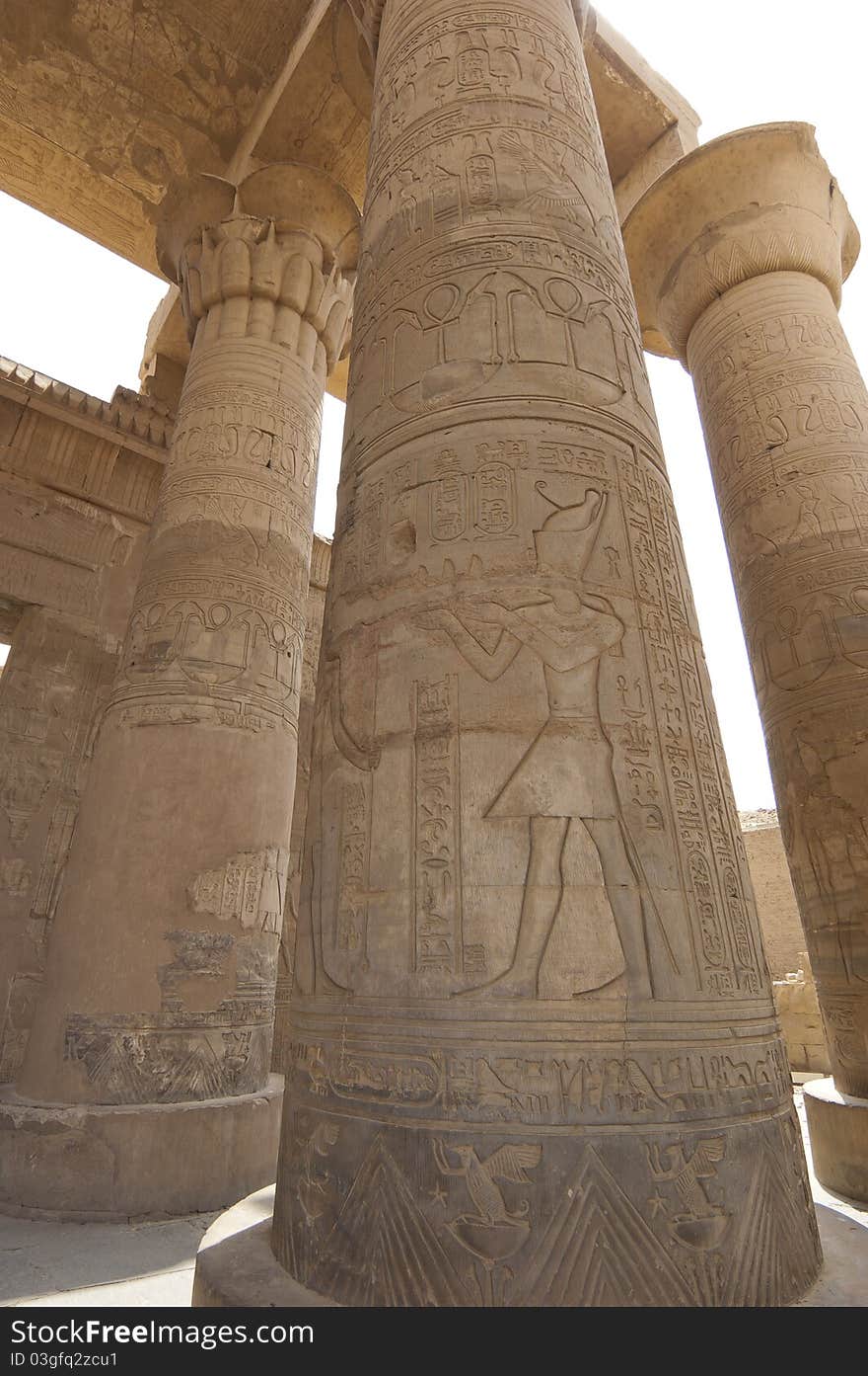 Columns at the Temple of Kom Ombo in Egypt with hieroglyphic carvings. Columns at the Temple of Kom Ombo in Egypt with hieroglyphic carvings