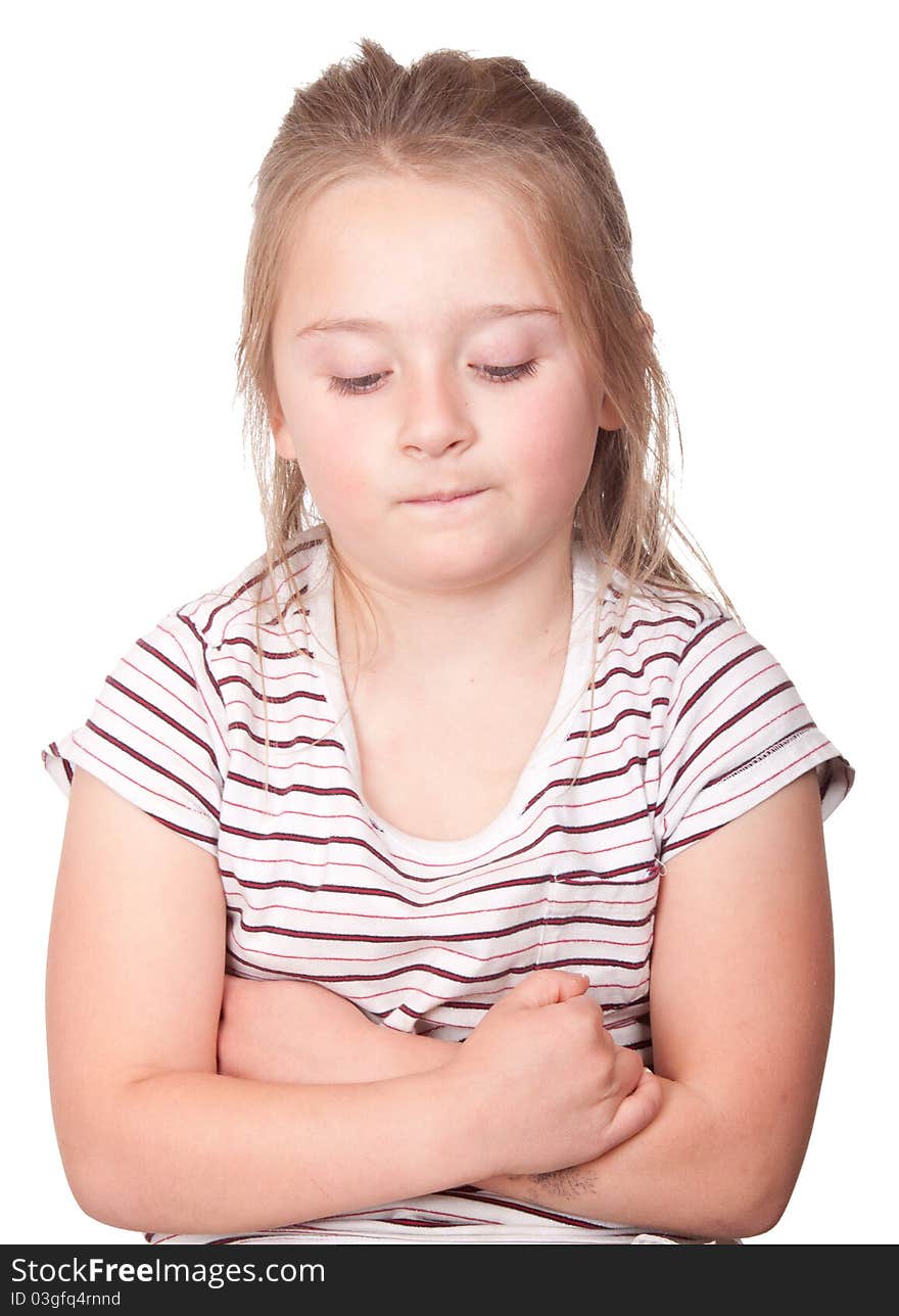 A photograph of a young girl with her arms crossed and a curious look on her face. A photograph of a young girl with her arms crossed and a curious look on her face.