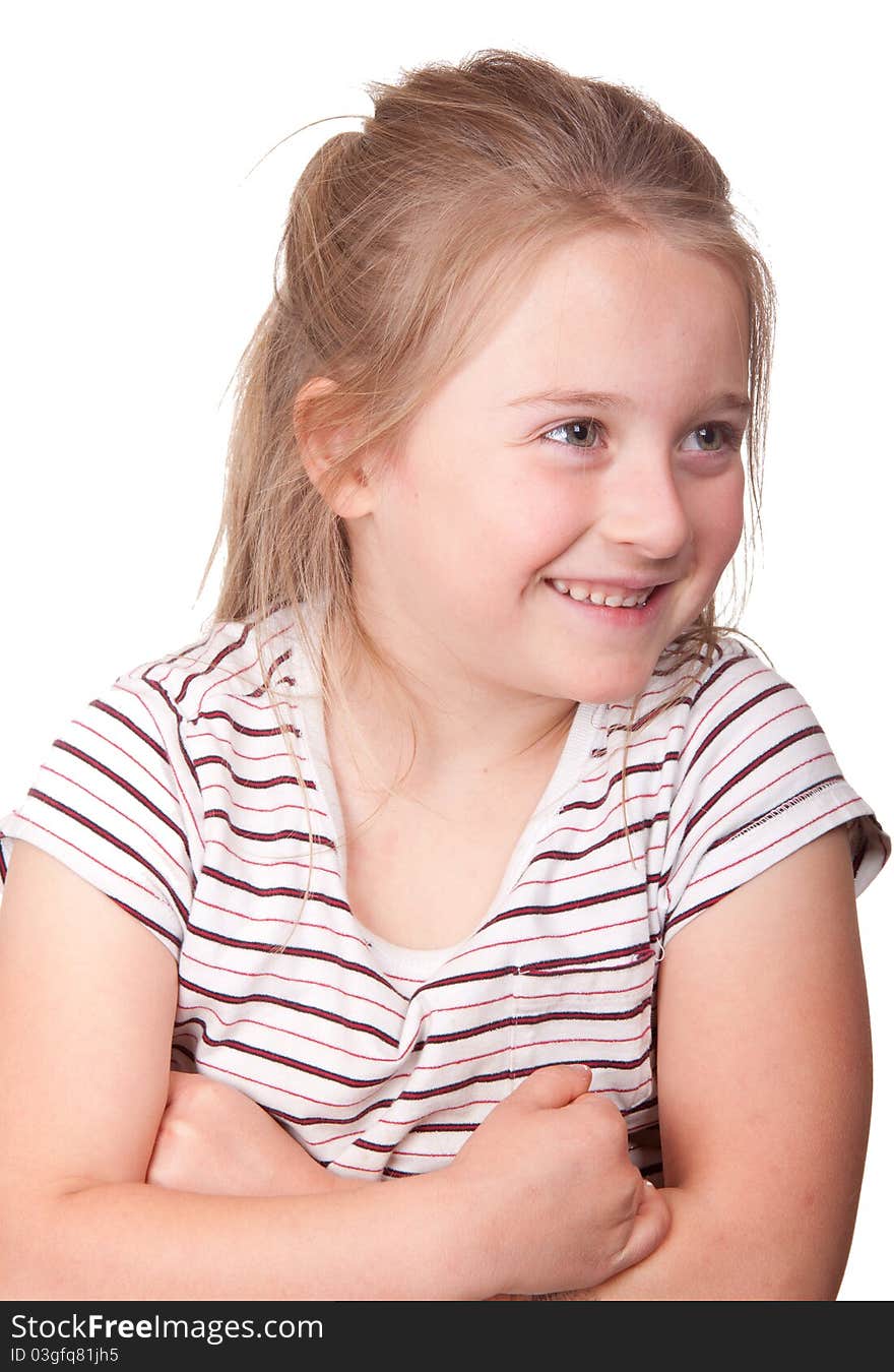 A photograph of a young girl with her arms crossed and a happy smile on her face. A photograph of a young girl with her arms crossed and a happy smile on her face.