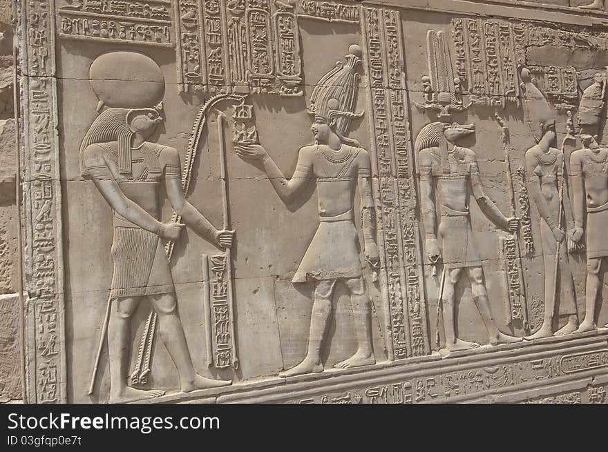 Hieroglyphic carvings on an Egyptian temple wall